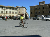 on bike in
piazza, Montefalco, Umbria